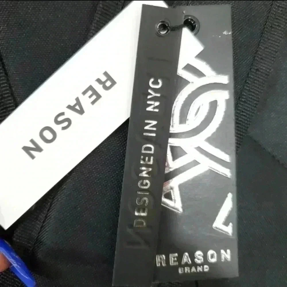 Reason zipper print compartment
